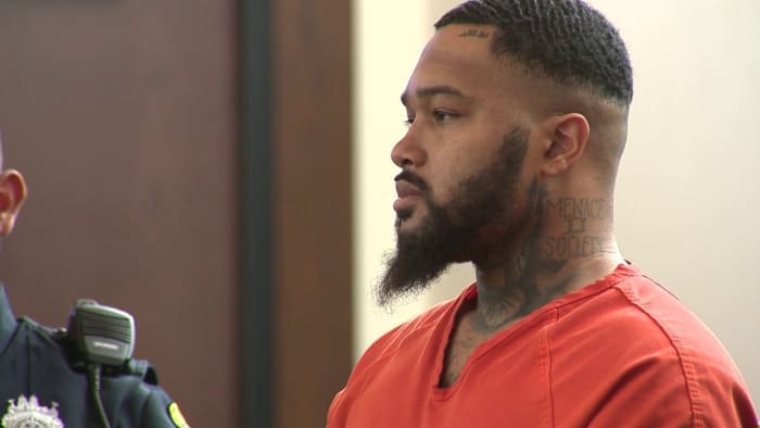 Man sentenced to 20 years for killing woman by shooting through apartment wall.
