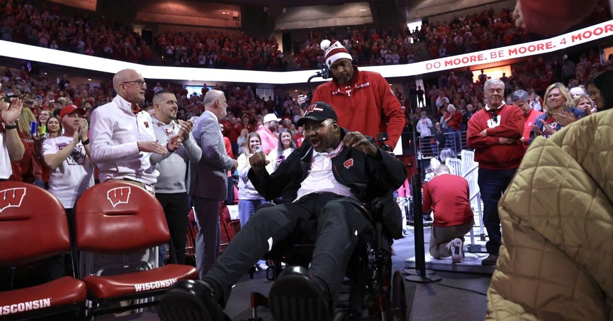 Featured image for "Emotional Return: Howard Moore Honored at Wisconsin Basketball Game"