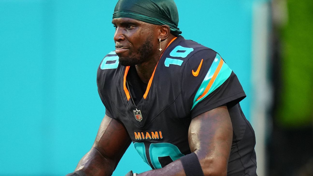Featured image for Tyreek Hill Returns to Dolphins Facility Amid Injury Concerns and Roster Changes