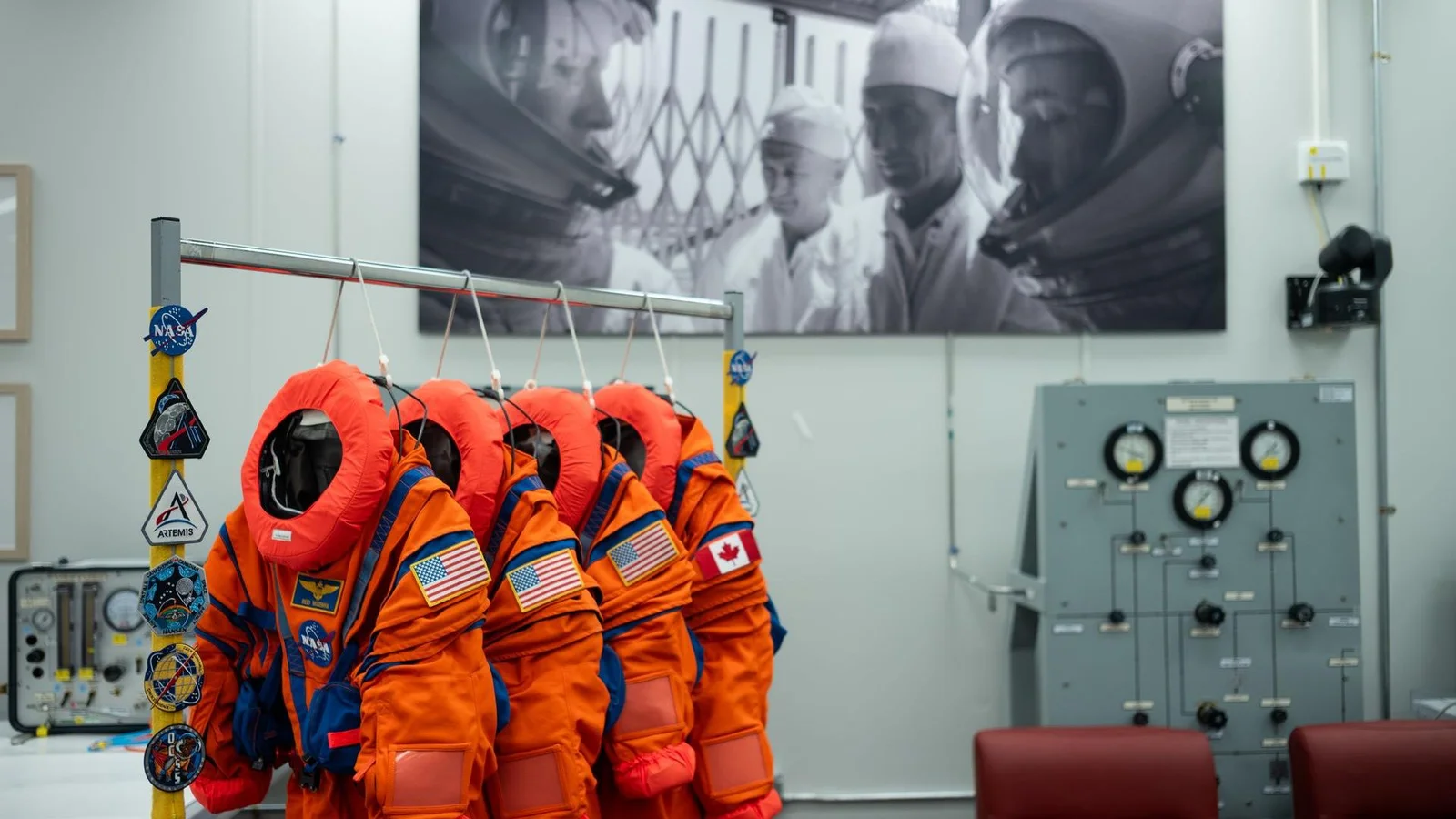 Artemis II crew suited up for lunar flyby as four orange spacesuits are prepped