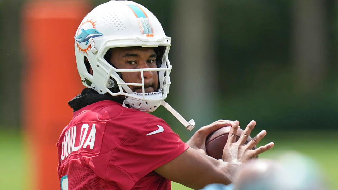 "2023 Miami Dolphins: Tua Tagovailoa's Playoff Potential and Training Camp Battles to Watch"