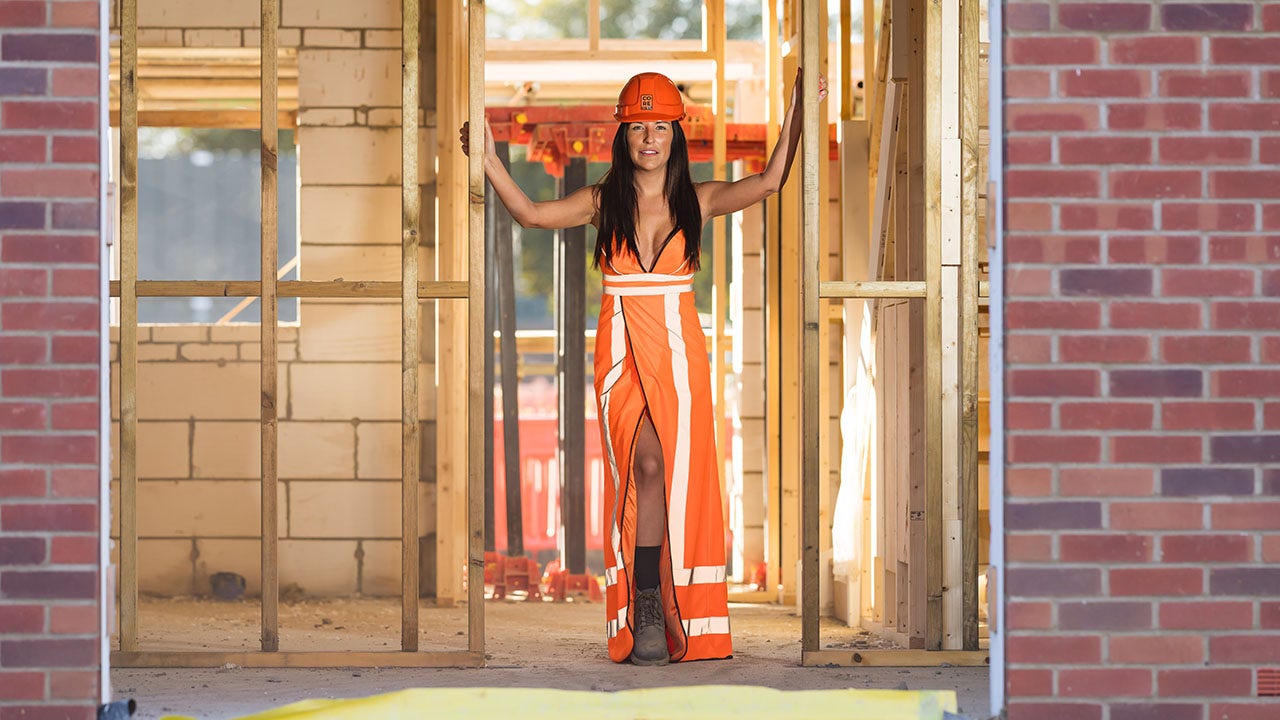 Featured image for "Construction CEO Stuns Industry Awards in High-Visibility Vest Evening Gown"