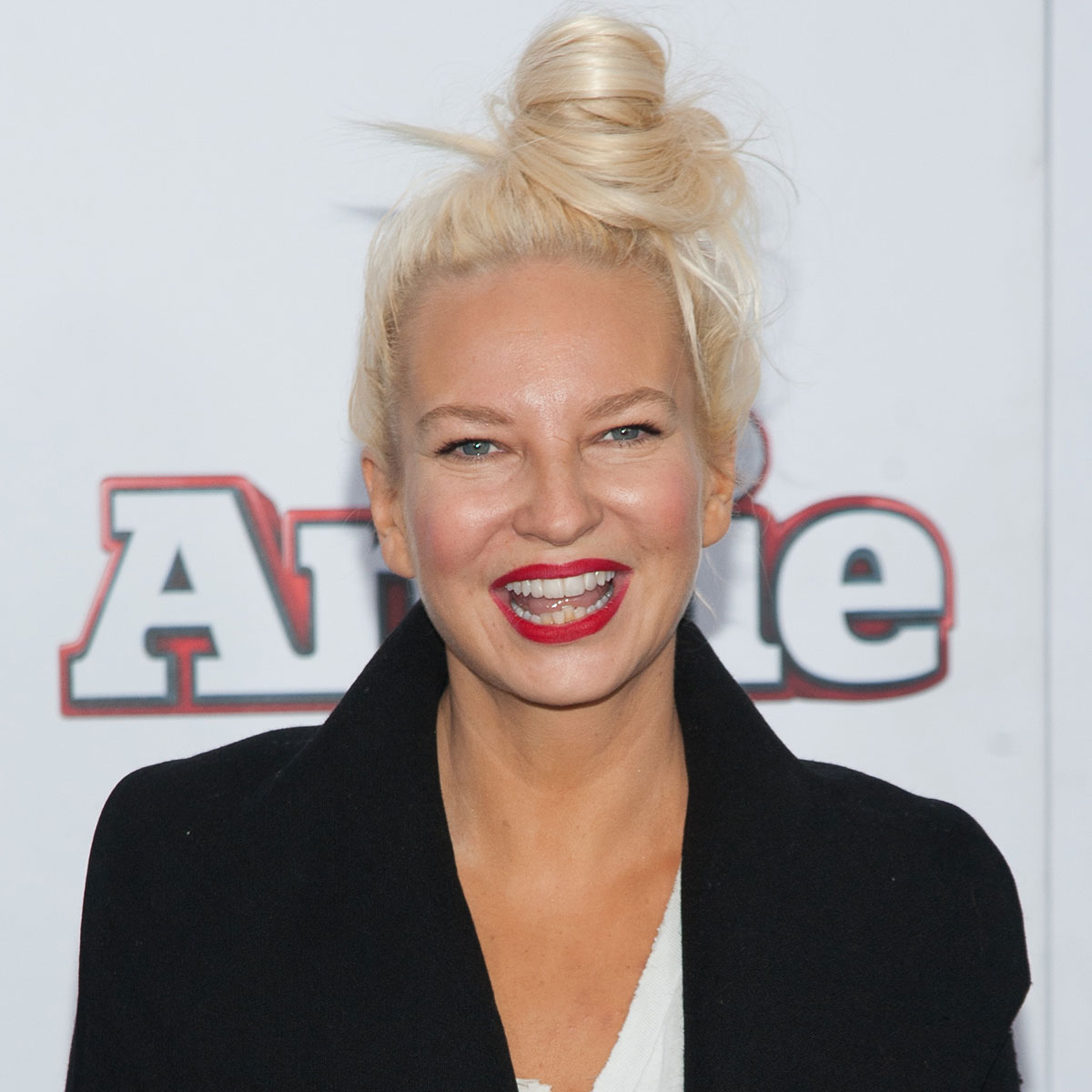 Featured image for Sia, 47, Flaunts Youthful Transformation After Raving About "Incredible" Facelift