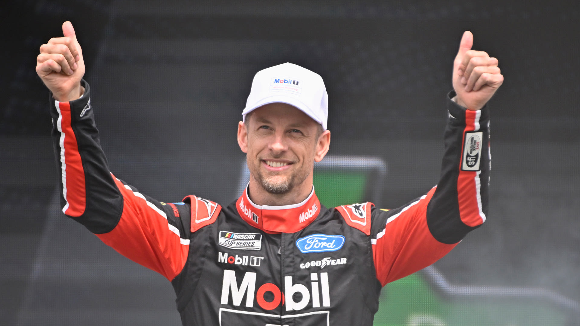 Featured image for Jenson Button's NASCAR debut plagued by heat exhaustion and embarrassment.