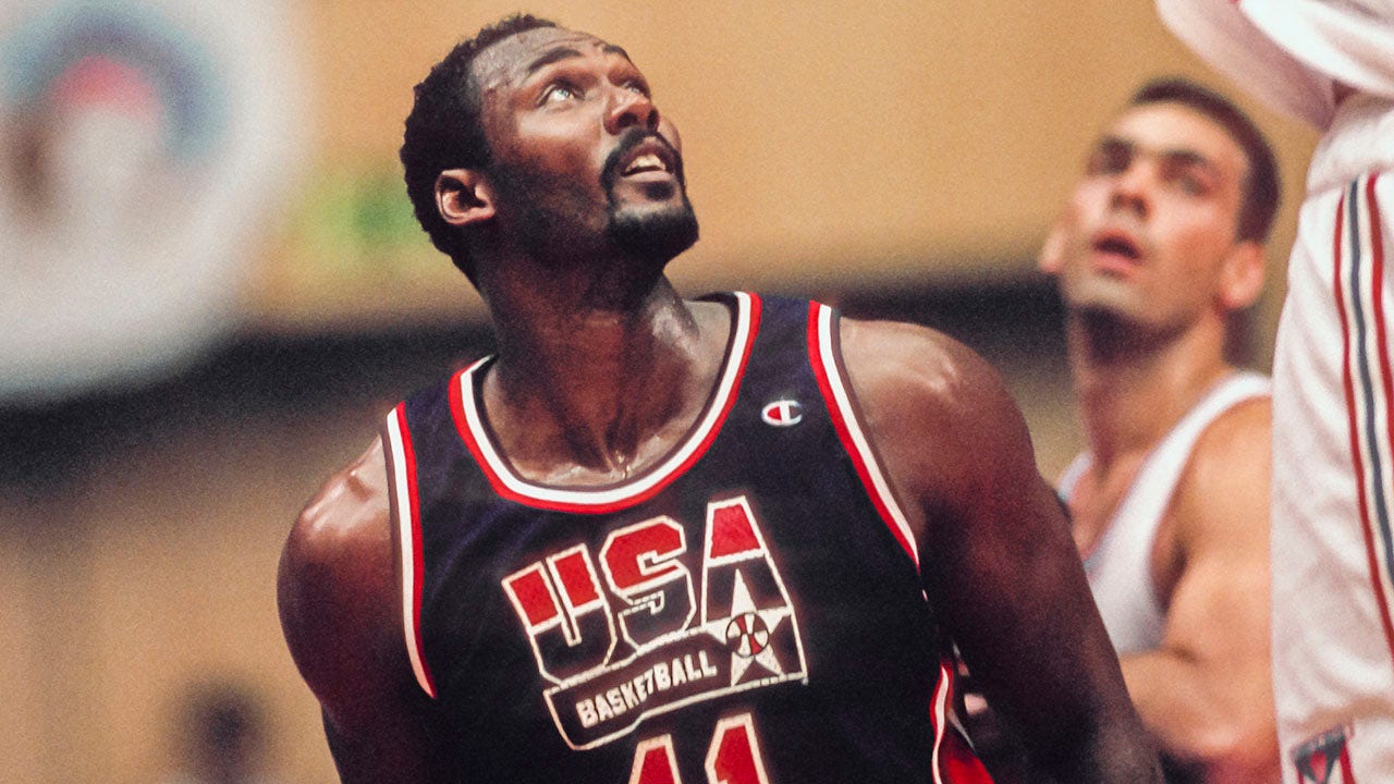 Featured image for Karl Malone rakes in $5 million from Dream Team memorabilia auction, including Michael Jordan jersey.
