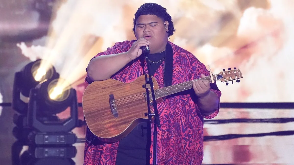 American Idol Winner Addresses Rigging Rumors and Father's Impact on Music Career.