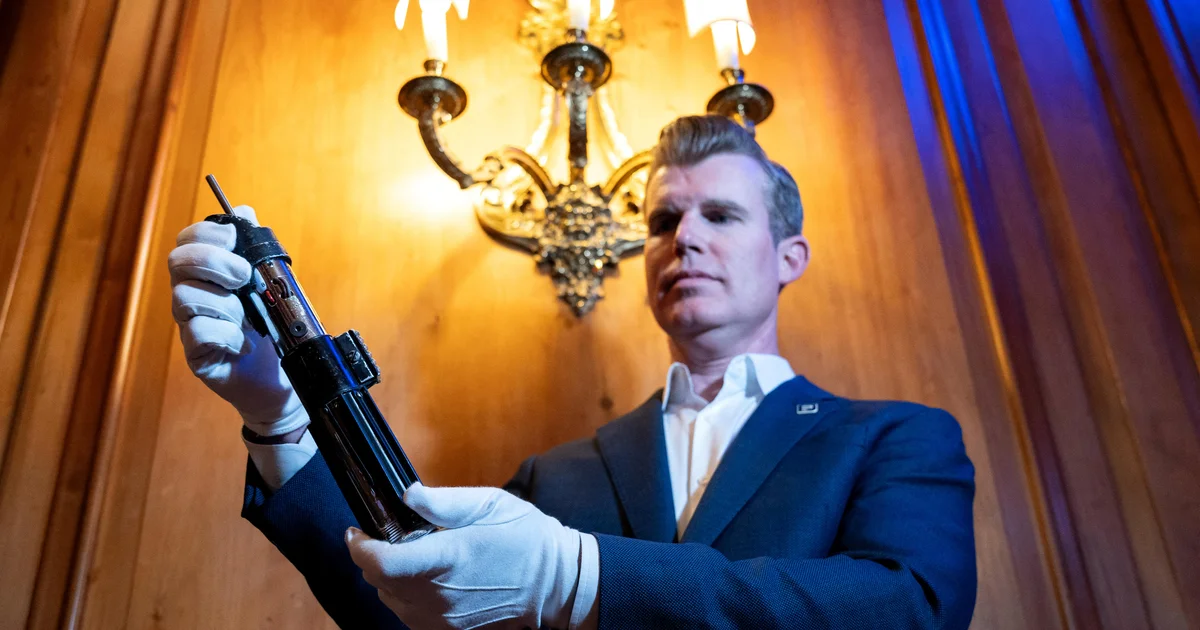 Featured image for Darth Vader's Lightsaber Sells for Over $3.6 Million at Auction