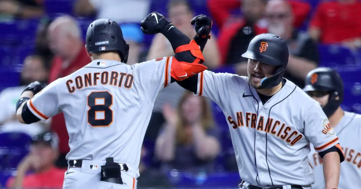 Conforto's heroics lead Giants to extra-inning victory over Marlins.