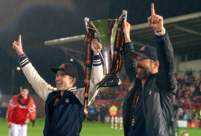 Featured image for "Wrexham's Promotion Brings Tears of Joy to Ryan Reynolds and Rob McElhenney"