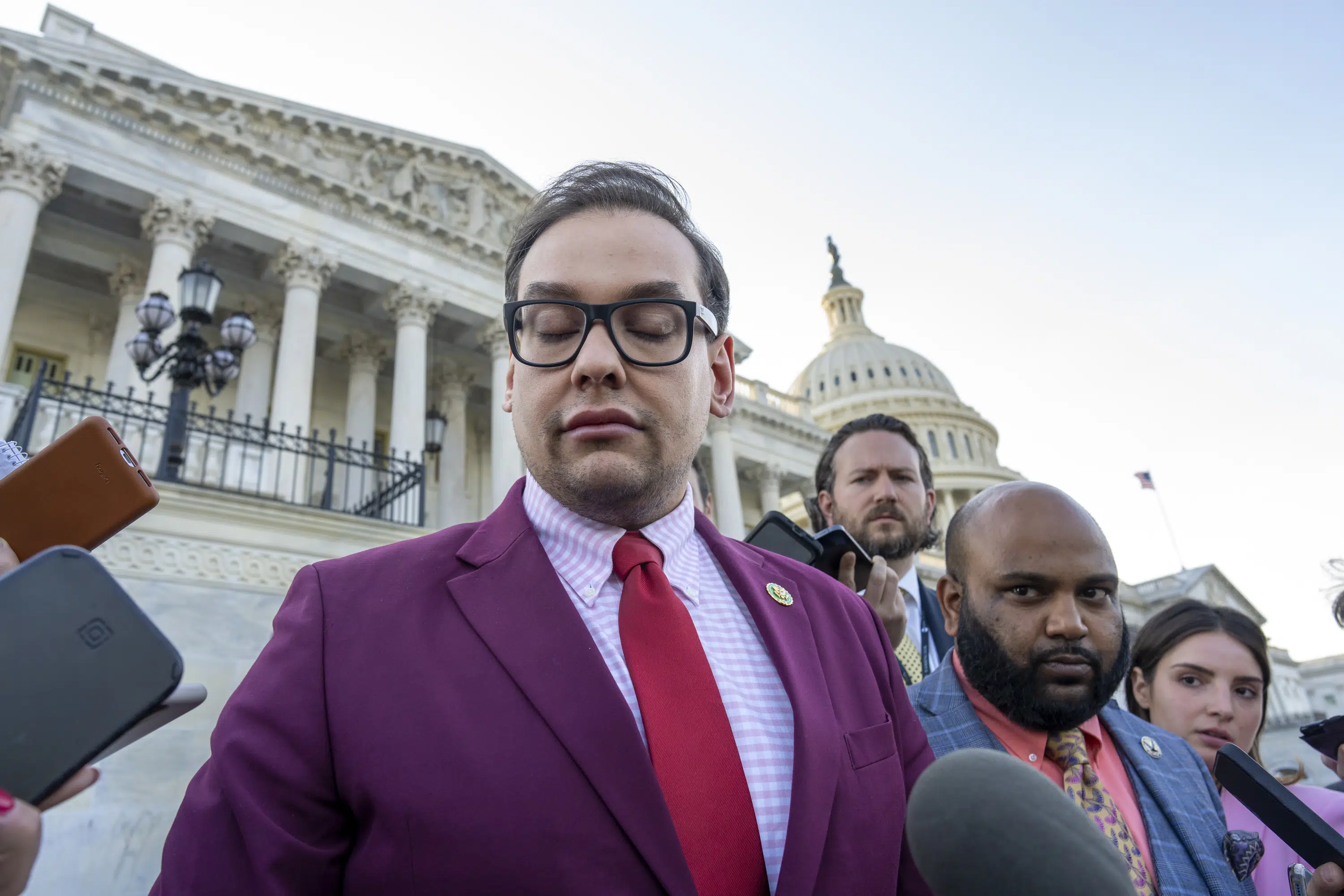 Rep. George Santos Refuses to Reveal Identities of Bond Cosigners, Risking Jail Time.