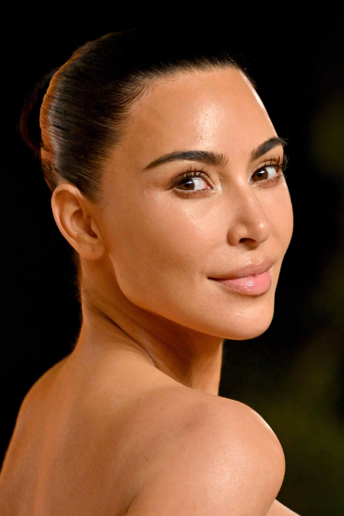 Featured image for Kim Kardashian Stuns at Paris Fashion Week with Bold Looks and Diamond Glamour