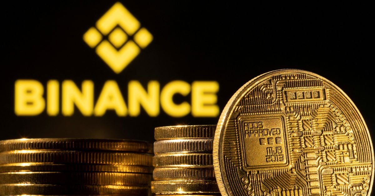 Featured image for Binance halts bitcoin withdrawals due to network congestion, causing crypto stocks to drop.