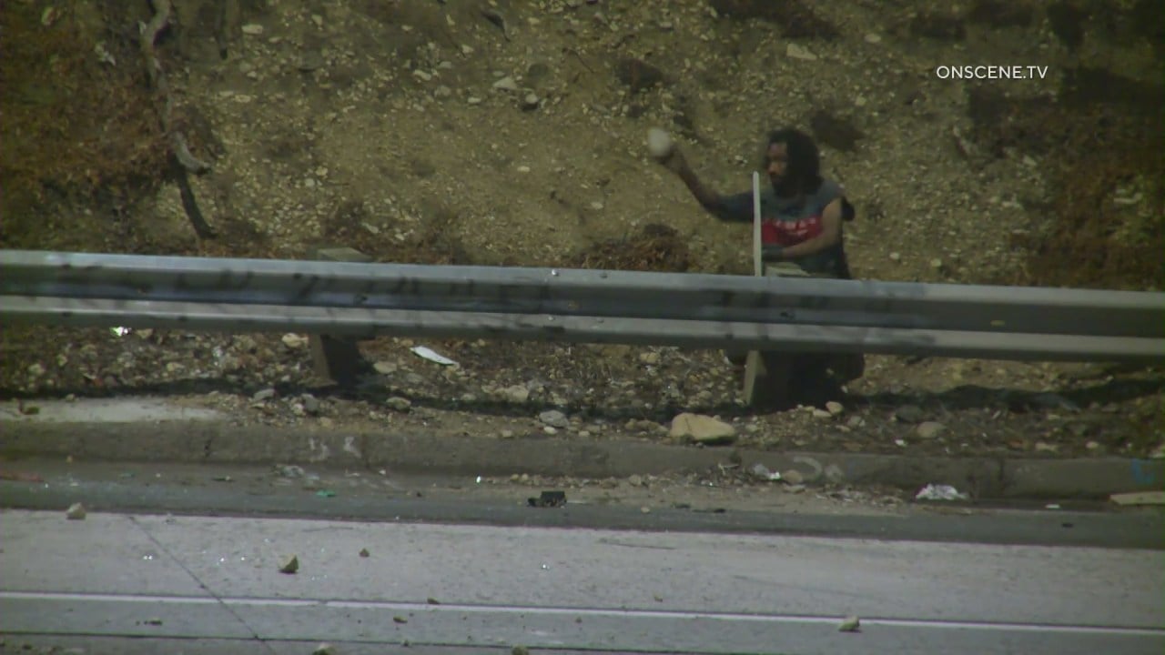 Featured image for Man Throws Rocks on LA Freeway, Causing Motorcyclist Crash and Car Damage