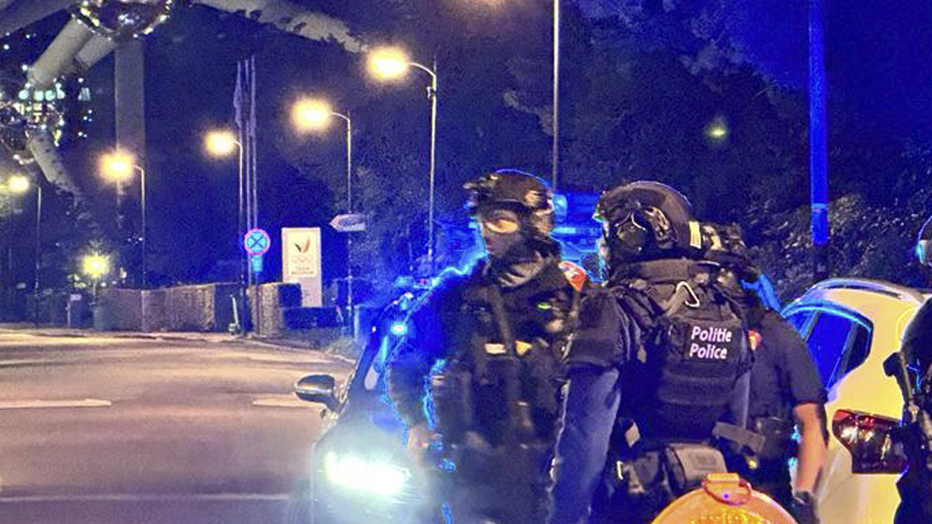 "Gunman's Deadly Attack in Brussels Spurs Terror Alert and Halts Soccer Game"