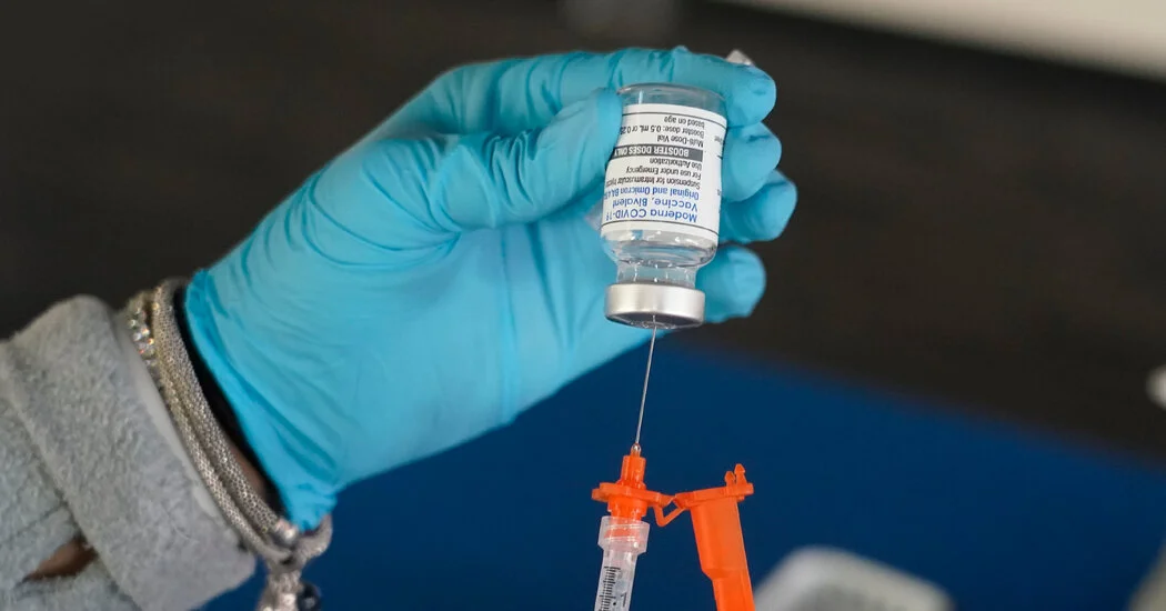 Featured image for F.D.A. Approves Updated COVID Shots Amid Ongoing Public Debate