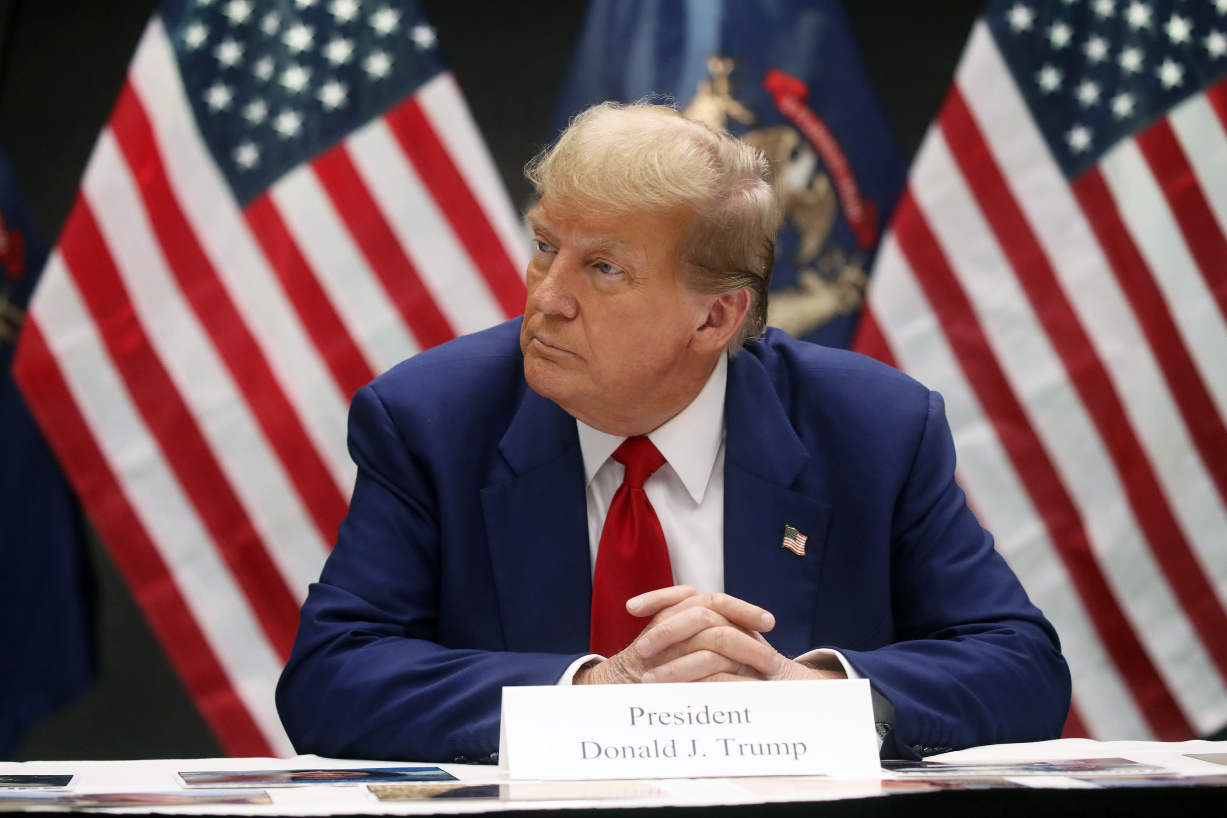"Trump's Financial Troubles: Calls for Fraud Investigation and Tanking Media Company"