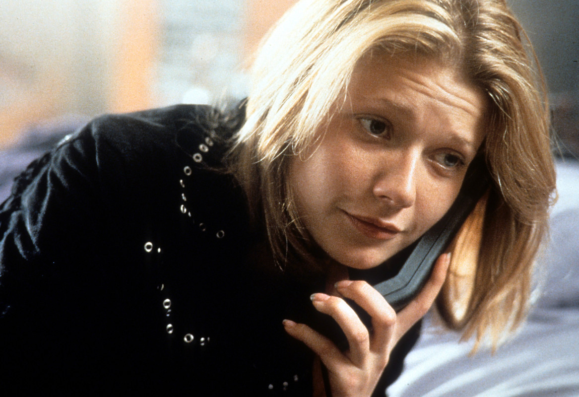 Featured image for '90s Icon, 52, Stuns in Black Swimsuit During Yacht Trip