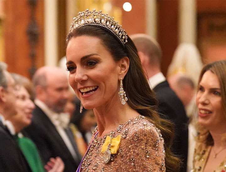 Featured image for "Kate Middleton Shines in Sequin Gown and Lover's Knot Tiara, Stealing the Show at Buckingham Palace"