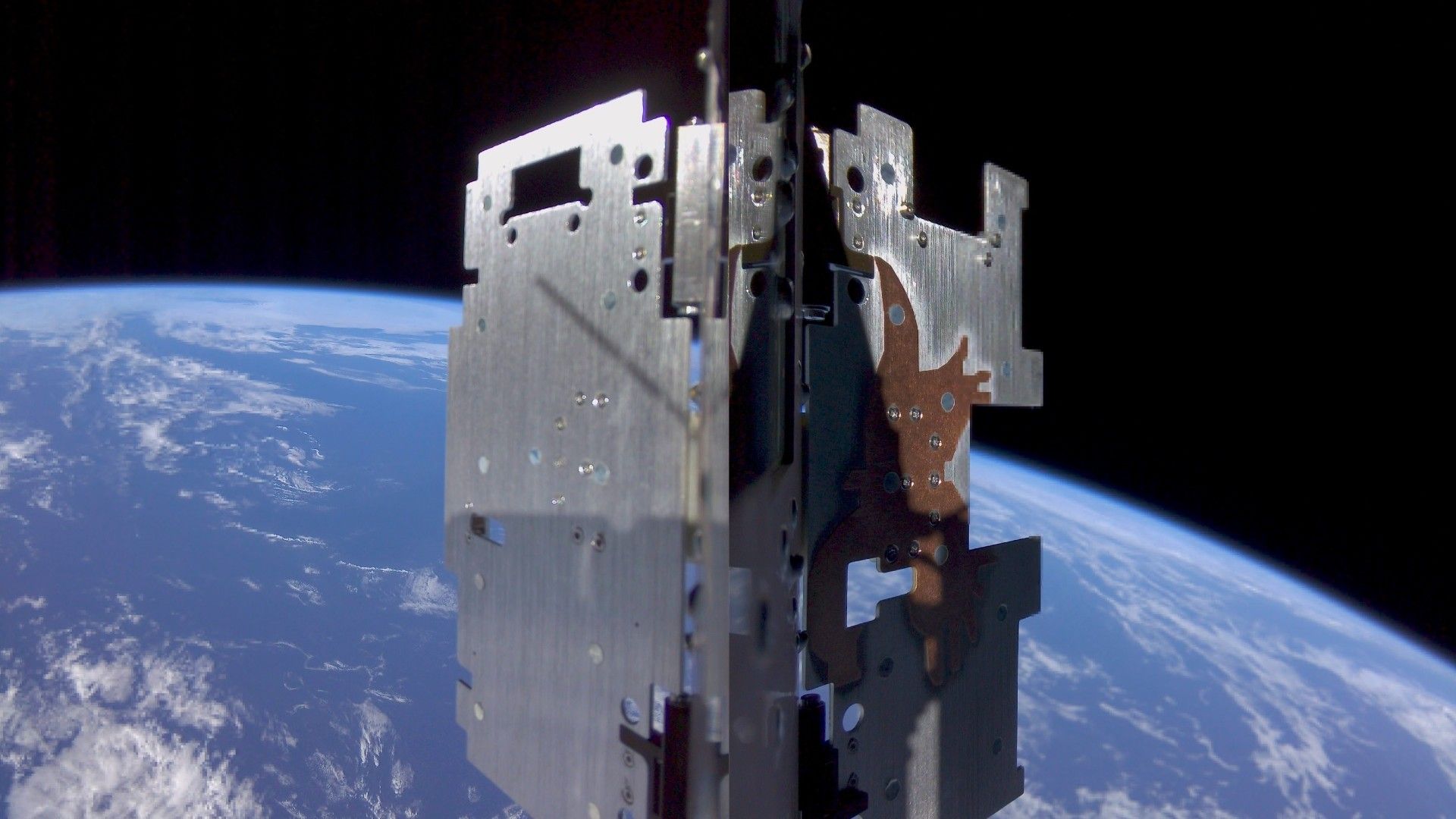 Featured image for Australian nanosatellite captures first space selfie before studying gamma-ray bursts