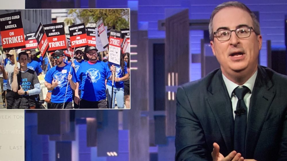 Featured image for John Oliver's Fiery Return: Praising WGA, Trolling Boebert, and Scolding Hollywood Studios