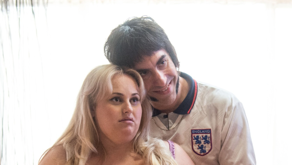 Featured image for "Rebel Wilson Accuses Sacha Baron Cohen of Targeting Her Body Size for Humiliation"