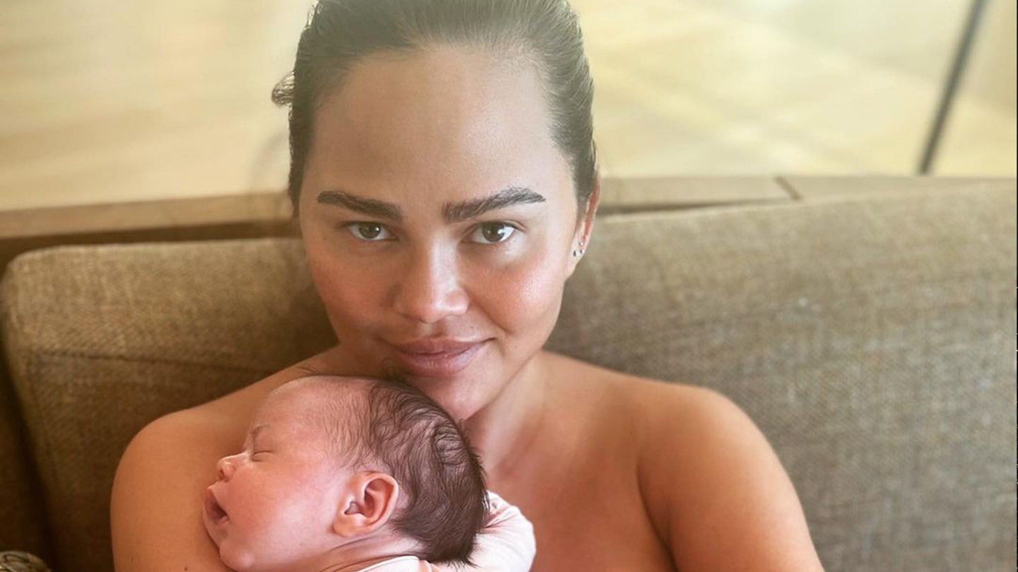 Featured image for Chrissy Teigen Shuts Down Surrogate Rumors with C-Section Photo