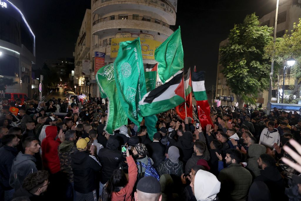 Hostages released by Hamas cross into Israel as cease-fire deadline approaches