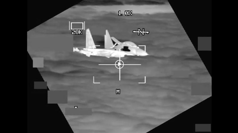Close Encounter: Chinese Fighter Jet's Near Collision with US Bomber over South China Sea