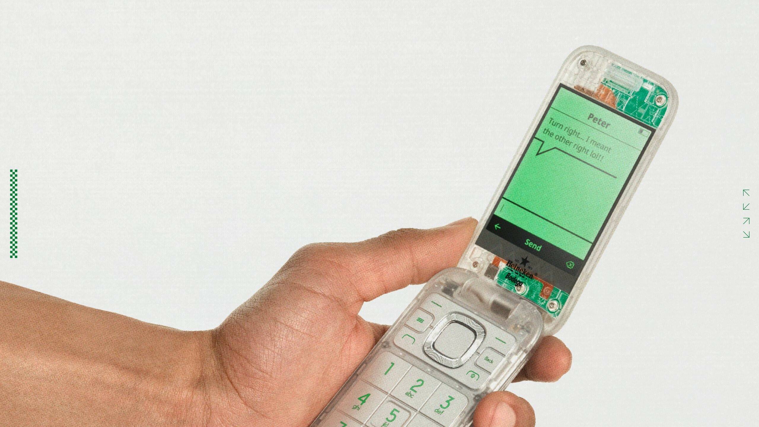 Featured image for "Heineken's Nostalgic Flip Phone: Stripping Away Features for Boring Charm"