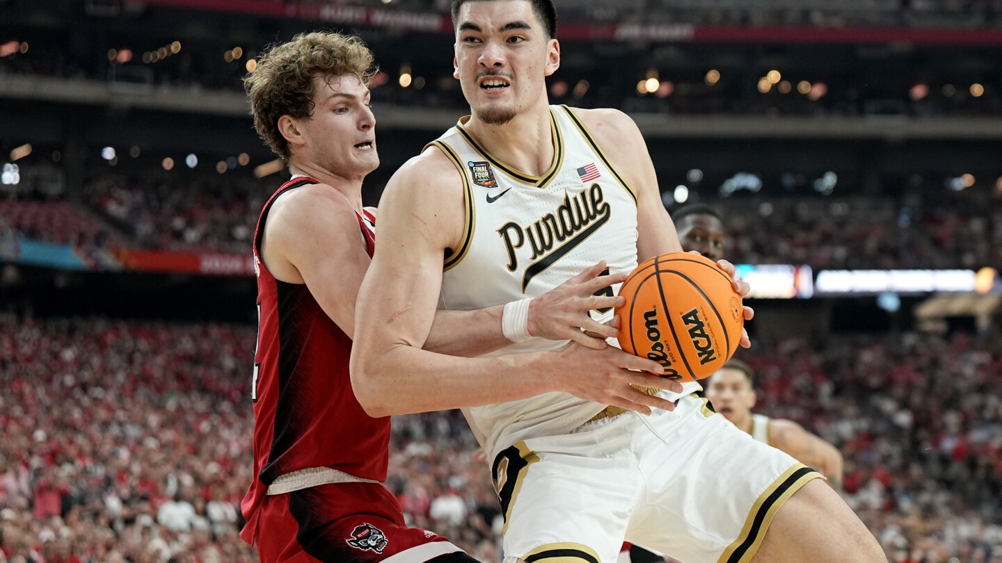 Featured image for "Purdue's Zach Edey Leads Team to NCAA Championship Game Victory"