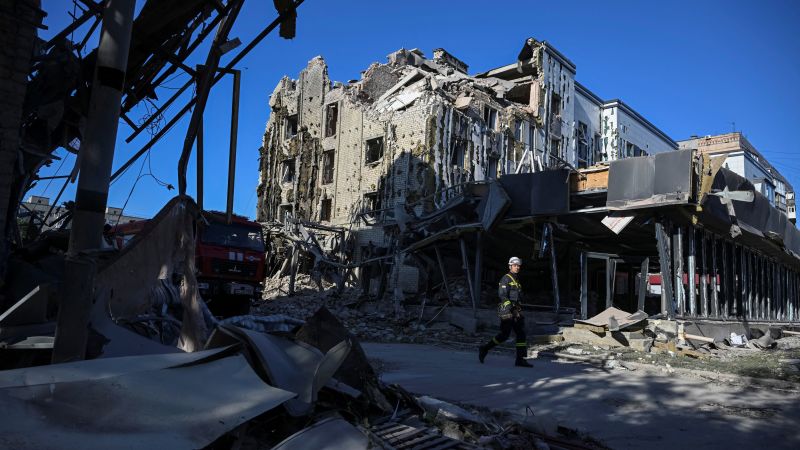 "Double Tragedy: Russian Strikes in Ukraine Claim Civilian Lives and Target Rescuers"
