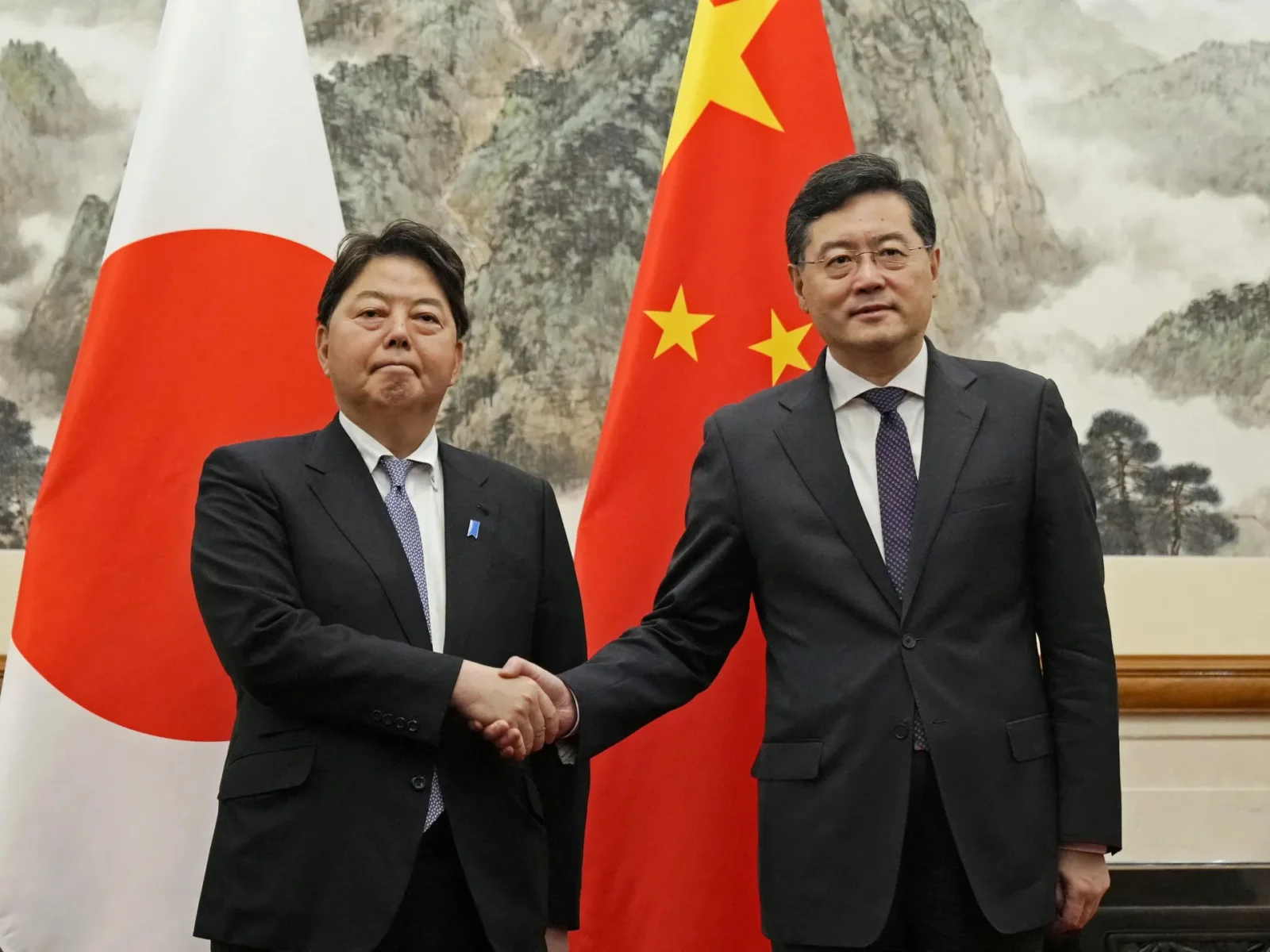 Japan urges China to release detained national and protests maritime action.