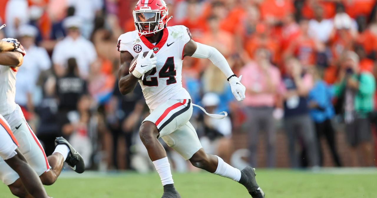 "Georgia Football Maintains Top Spot in College Football Playoff Rankings Ahead of SEC Championship Game"