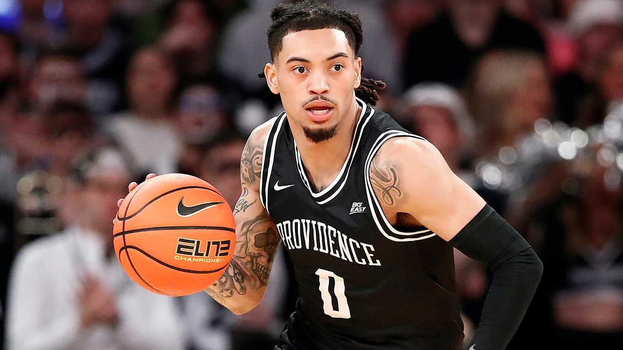 Featured image for Providence College basketball player arrested on domestic and firearm charges.