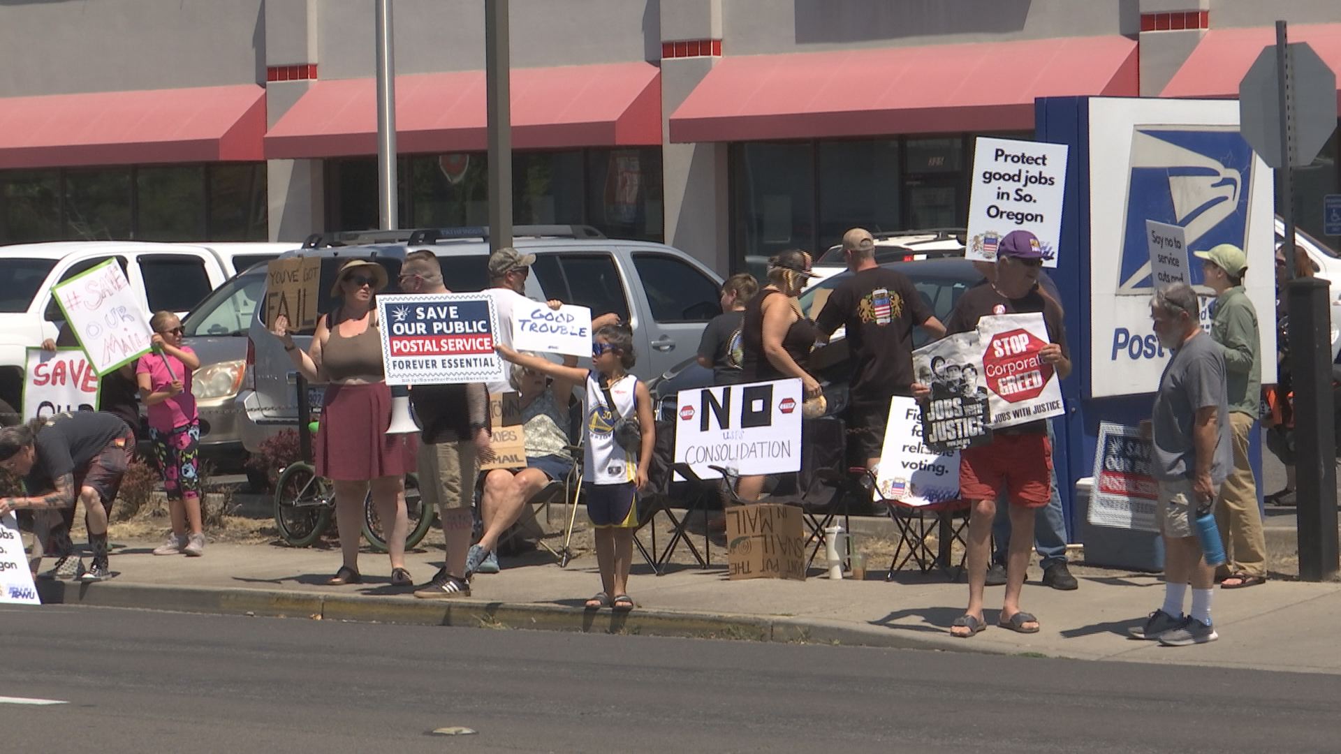 Featured image for USPS workers rally against consolidation in Medford