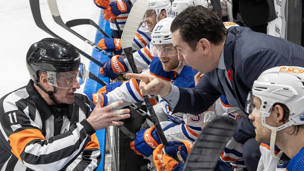 Featured image for "Oilers Coach Ejected in Blowout Loss to Canucks Amid Mounting Frustrations"