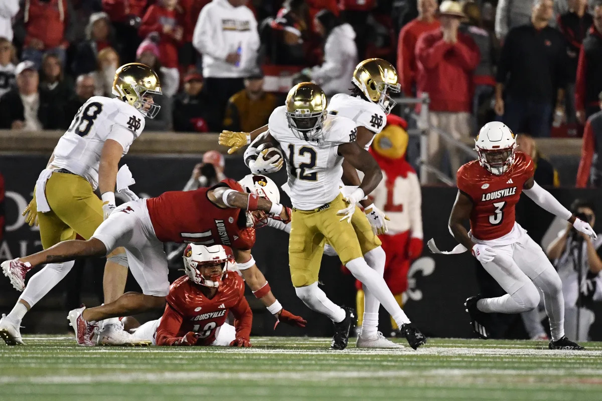 "Louisville Shocks Notre Dame in Undefeated Showdown"