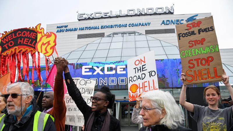 Climate activists disrupt Shell shareholder meeting with fiery protests.