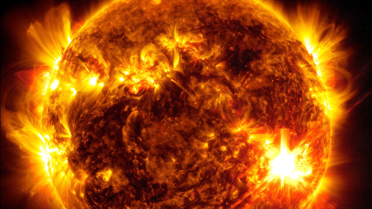 "Historic Sunspot Returns, Threatening Blackouts and Auroras"
