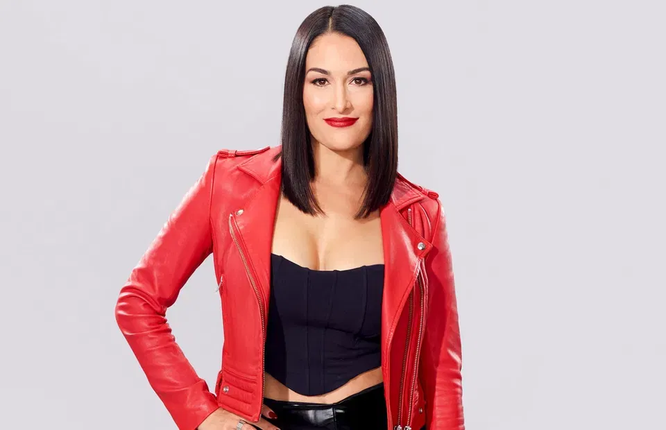 Featured image for Nikki Bella Opens Up About Heartbreaking Divorce from Artem Chigvintsev