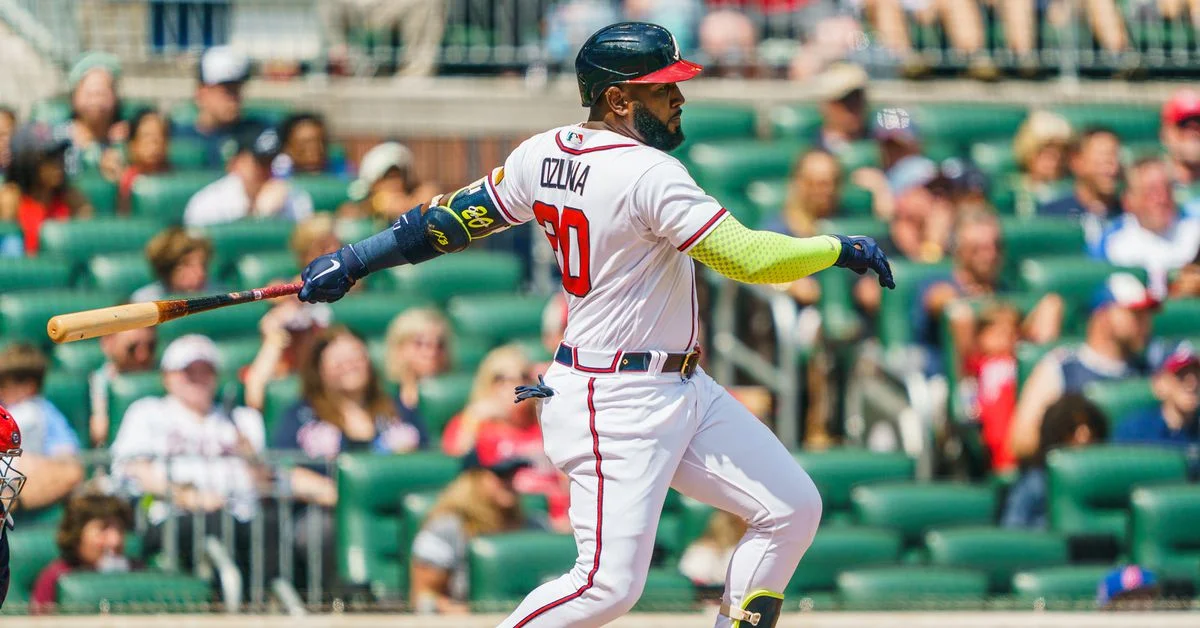 Braves' Marcell Ozuna day-to-day after hit by pitch.