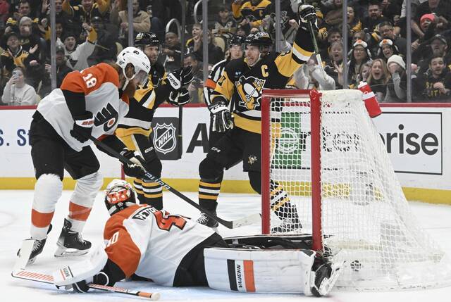 Featured image for "Penguins Edge Flyers in Wild 7-6 Win, Rust Injured"