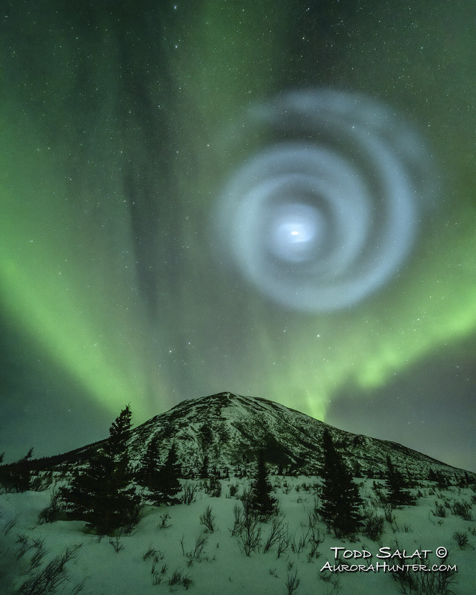 Featured image for Unraveling the Mystery of Alaska's Glowing Sky Spiral.