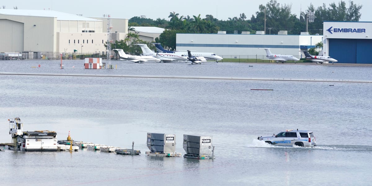 Florida flights diverted and airports closed due to historic rainfall and flooding.