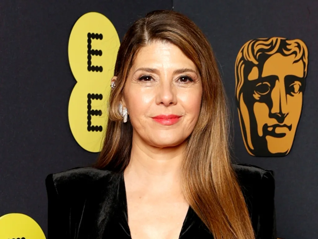 Featured image for Marisa Tomei Stuns in No-Makeup Swimsuit Video and Reveals Relaxation Secret