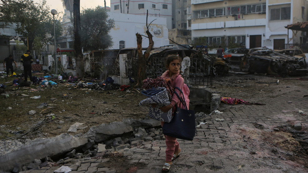 Featured image for "AP Visual Analysis: Gaza Rocket Misfire Causes Deadly Hospital Explosion"