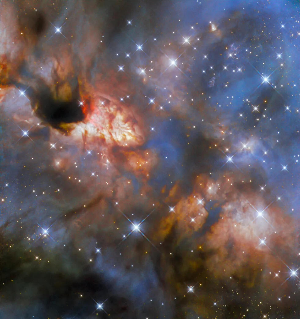 "Stunning Hubble Images Capture Star Formation 5,900 Light-Years Away"
