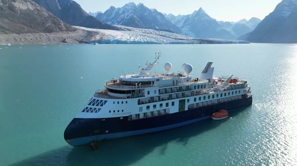 Luxury cruise ship freed in Greenland after COVID scare and grounding