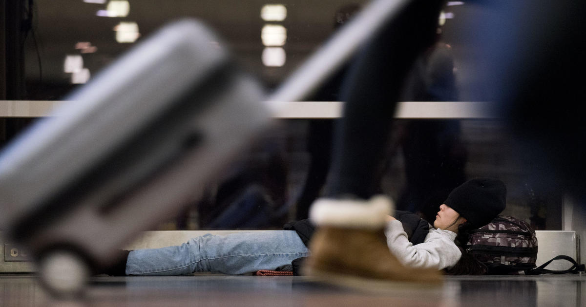 "Measles Warning for Travelers at Dulles and Reagan Airports"