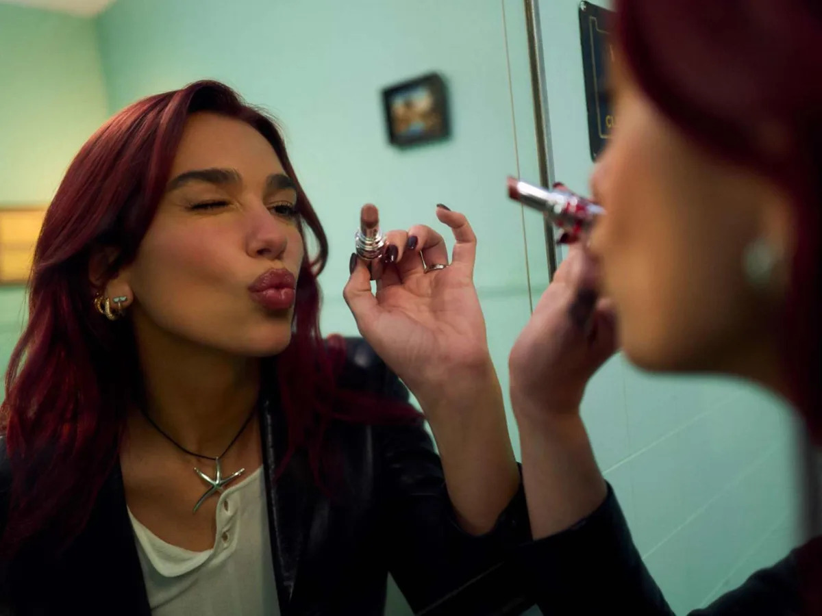 Featured image for "Dua Lipa's "Training Season" Single: Lipstick, ABBA Vibes, and Racing Energy"